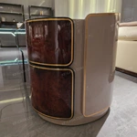 Luxury Bed End Cabinet with Natural Wood Veneer Drawer Fronts Upholstered Top and Stainless Steel Trim